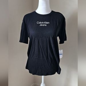 Boys black Calvin Klein shirt with white writing. New with tag size(XL-18/20).